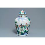 A Chinese wucai vase and cover with figures in a garden, seal mark, Transitional period