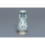 A Chinese blue and white 'lotus scroll' vase, Yuan