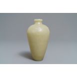 A Chinese light celadon jade relief-decorated meiping vase, 19/20th C.