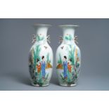 A pair of Chinese famille rose vases with ladies in a garden, 19/20th C.