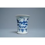 A Chinese blue and white brush pot with figures in a garden, Transitional period