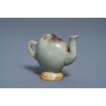 A Chinese miniature peach-shaped cadogan teapot with junyao glaze, Kangxi/Qianlong