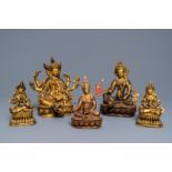 Five Sino-Tibetan gilt bronze Buddha figures, 19/20th C.