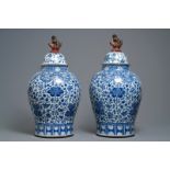 A pair of Chinese blue and white vases with faience replacement covers, Kangxi