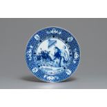 A Chinese blue and white dish after Cornelis Pronk: 'Dames au Parasol', Qianlong