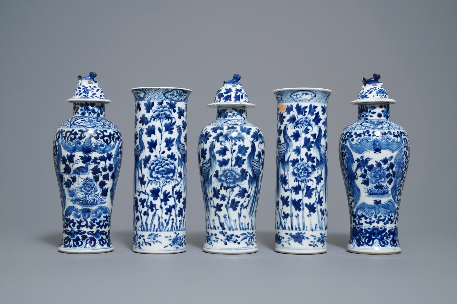 A Chinese blue and white five-piece garniture with peacocks, Kangxi mark, 19th C. - Image 3 of 8