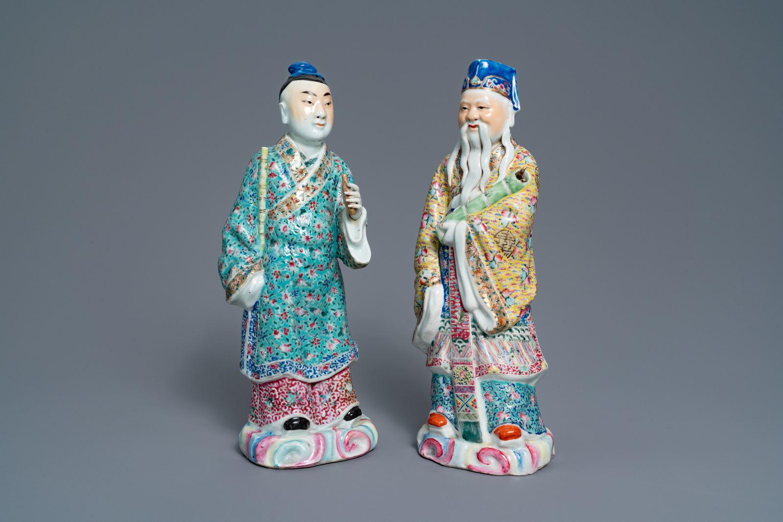 Two Chinese famille rose figures of immortals, 19/20th C.