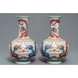 A pair of Chinese famille rose 'dragon' vases, Guangxu mark and of the period