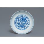 A Chinese blue and white 'dragon' plate, Qianlong mark and of the period