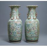 A pair of large Chinese famille verte celadon-ground vases with figural design, 19th C.