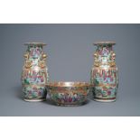 A pair of Chinese Canton famille rose vases and a bowl, 19th C.