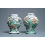 A pair of Chinese famille verte vases with birds and insects, Kangxi