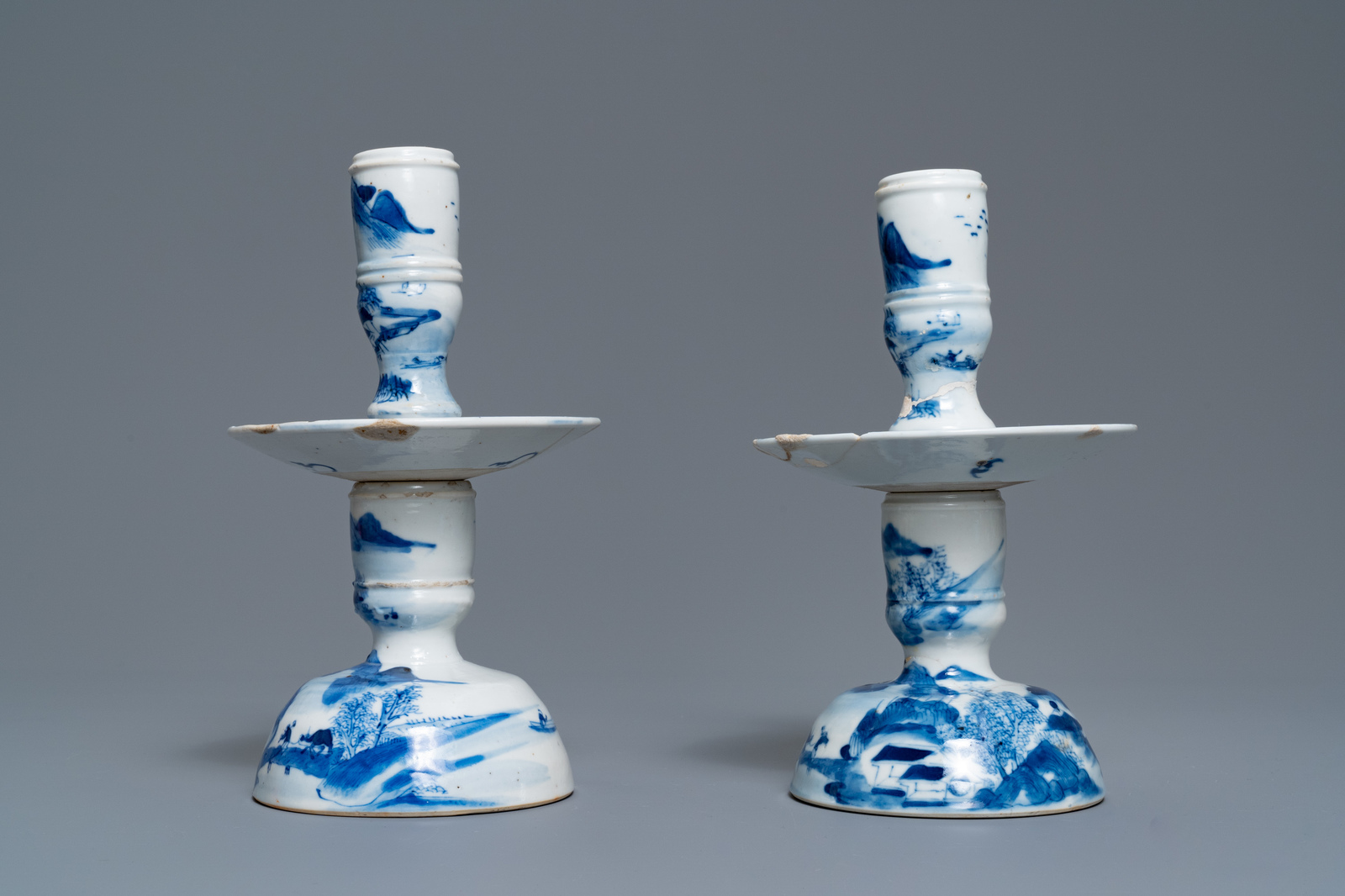 A pair of Chinese blue and white candlesticks and three famille rose figures of boys, 19th C. - Image 4 of 16