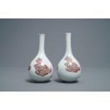 A pair of Chinese copper red 'mythical beasts' vases, Kangxi