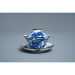 A Chinese blue and white Vietnamese market 'Bleu de Hue' covered bowl and saucer, 19th C.