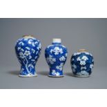 Three Chinese blue and white 'prunus on cracked ice' vases, Kangxi