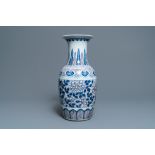 A Chinese blue, white and underglaze red vase, 19th C.