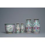 Two pairs of Chinese famille rose vases and a jardinire, 19th C.