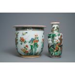 A large Chinese famille verte jardinire and a rouleau vase, 19th C.