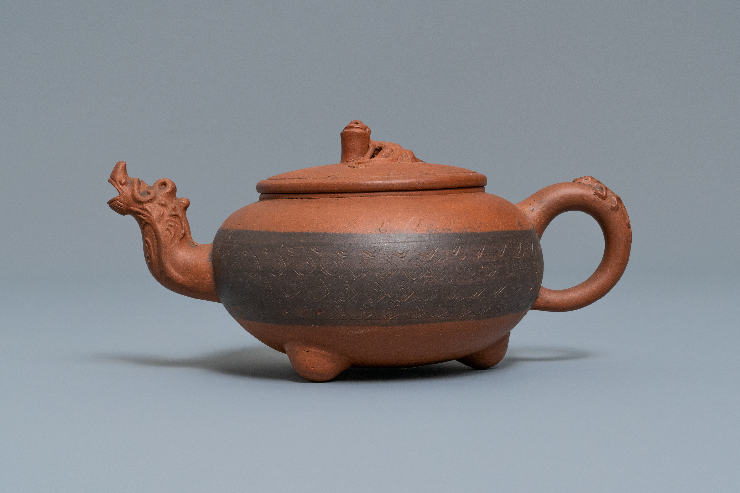 A Chinese Yixing stoneware dragon-spouted teapot and cover, impressed mark, 19/20th C. - Image 4 of 7