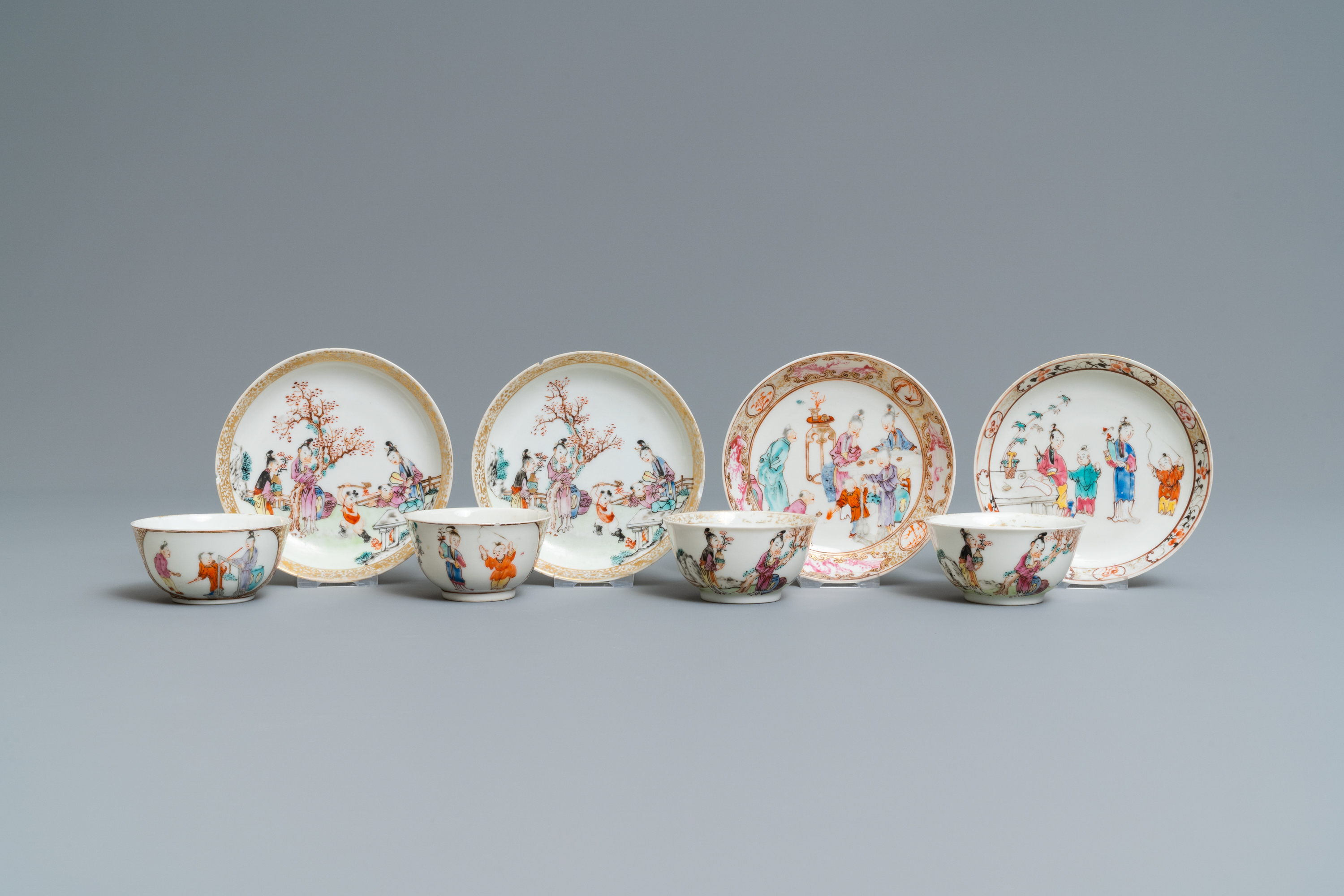 Four Chinese famille rose 'Mandarin' cups and saucers, Qianlong