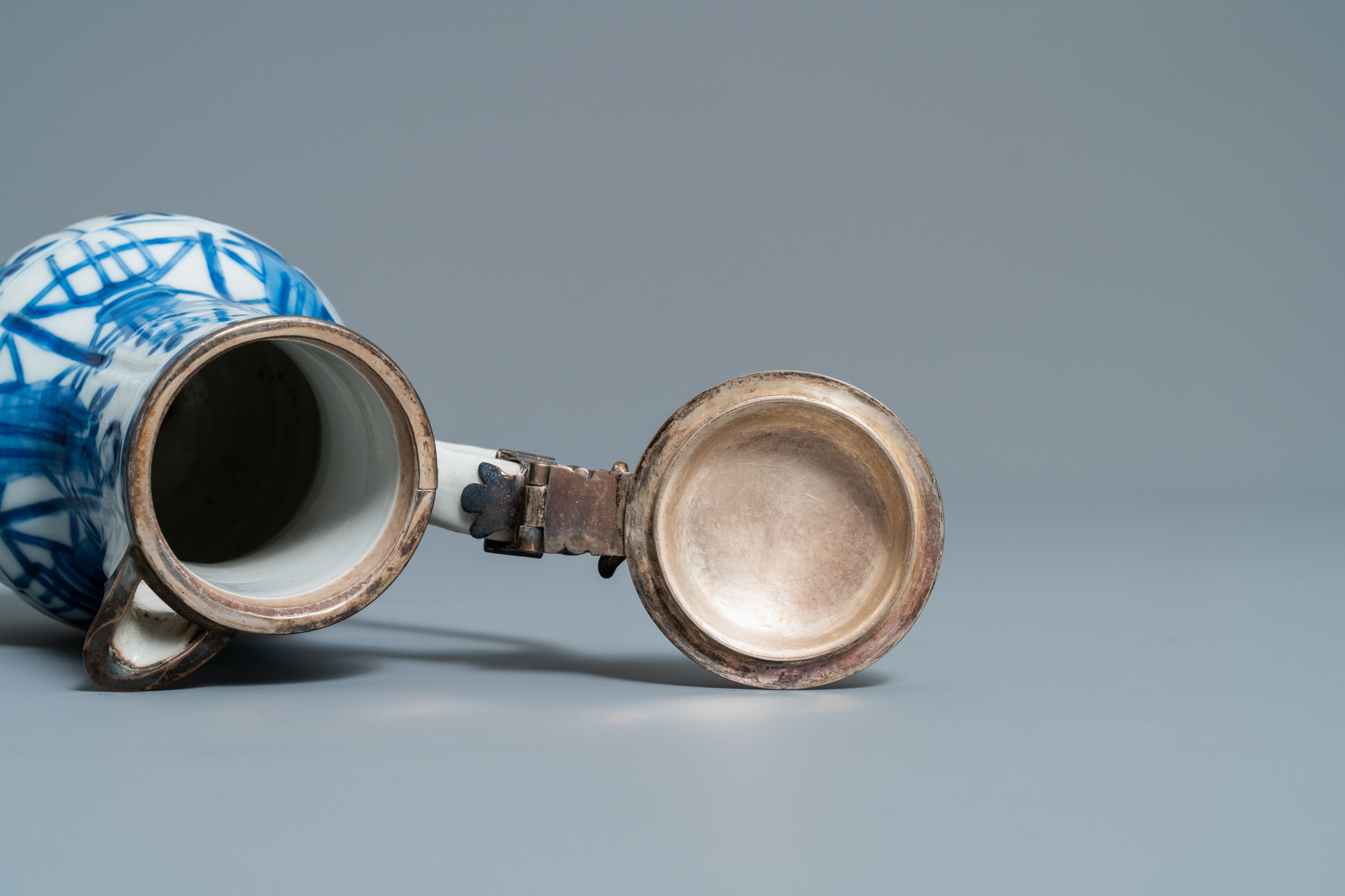 Three Chinese blue and white ewers, a teapot and a metal-mounted vase, Kangxi/Qianlong - Image 17 of 18