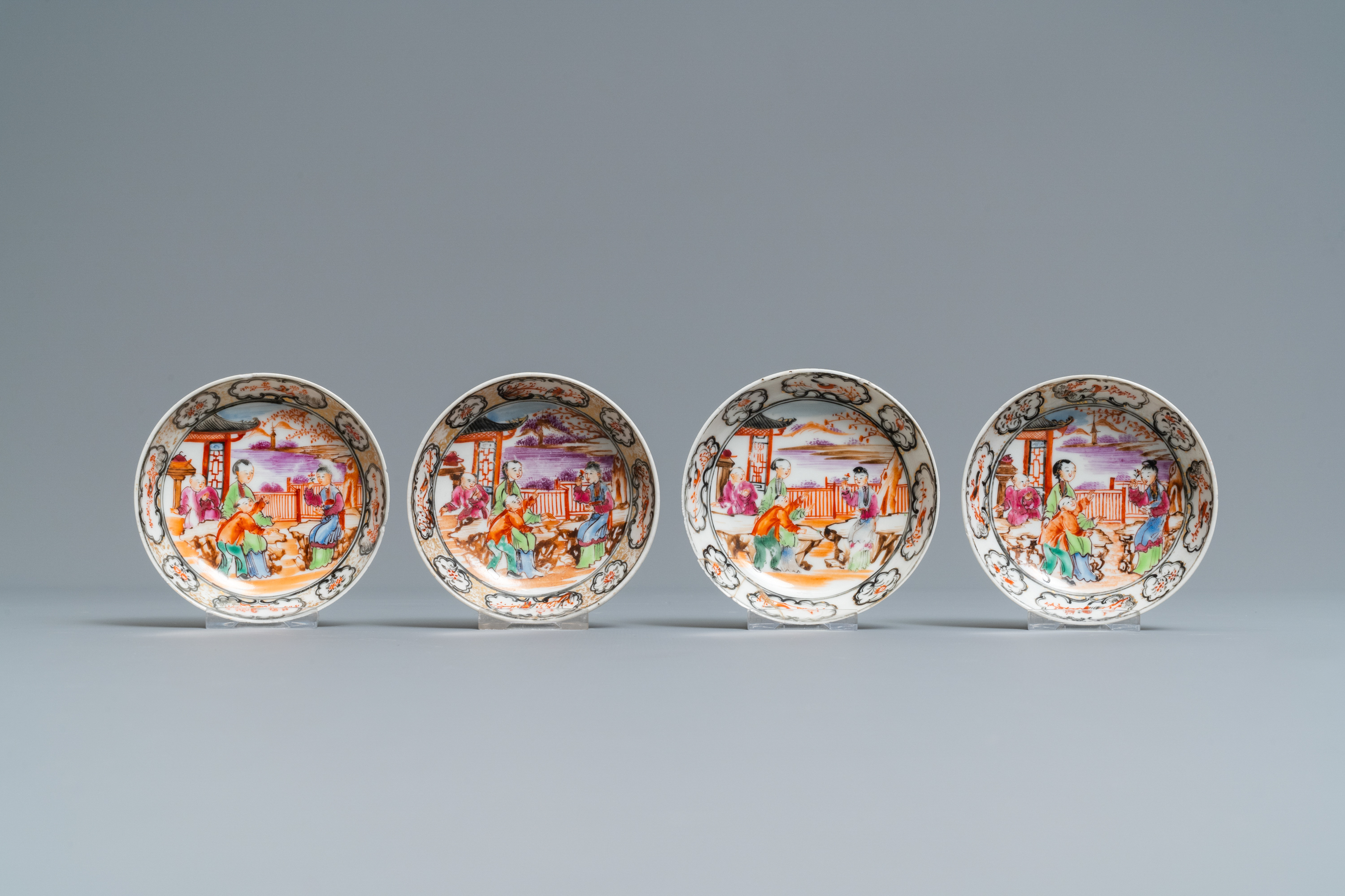 Seven Chinese famille rose 'Mandarin' cups and saucers, Qianlong - Image 4 of 9