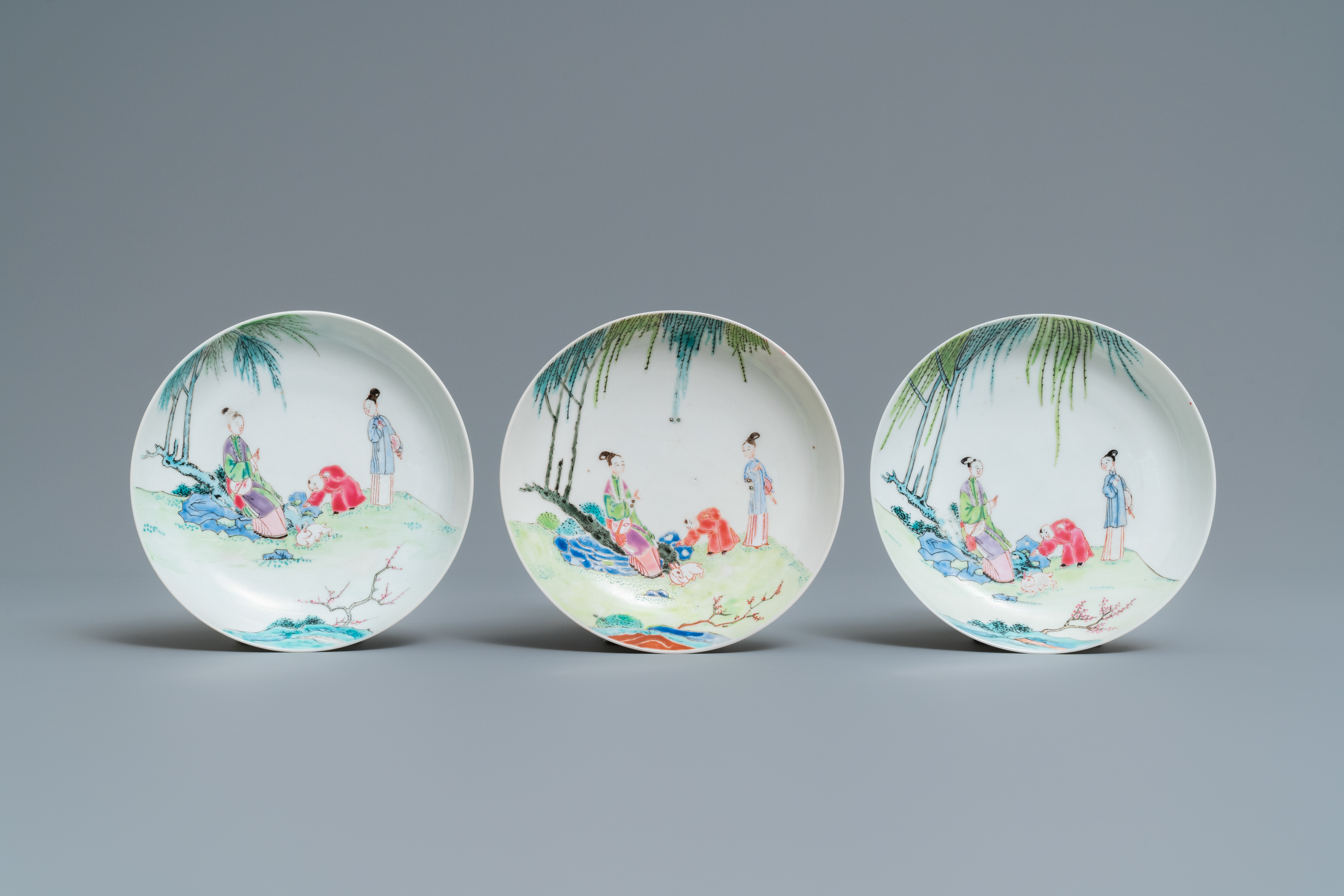 Three Chinese famille rose cups and saucers with figures in a garden, Yongzheng - Image 2 of 9