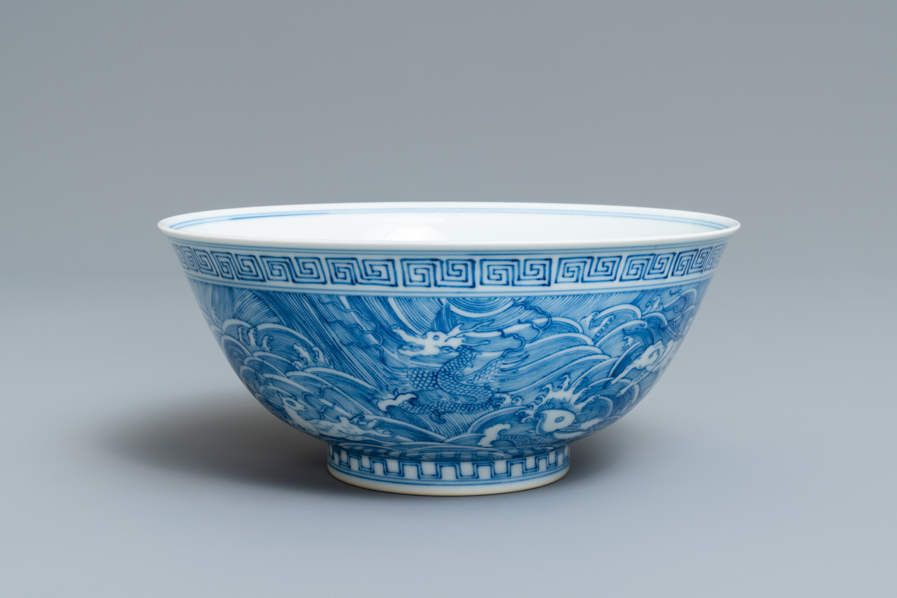 A Chinese blue and white 'mythical beasts' bowl, Guangxu mark, 19/20th C.