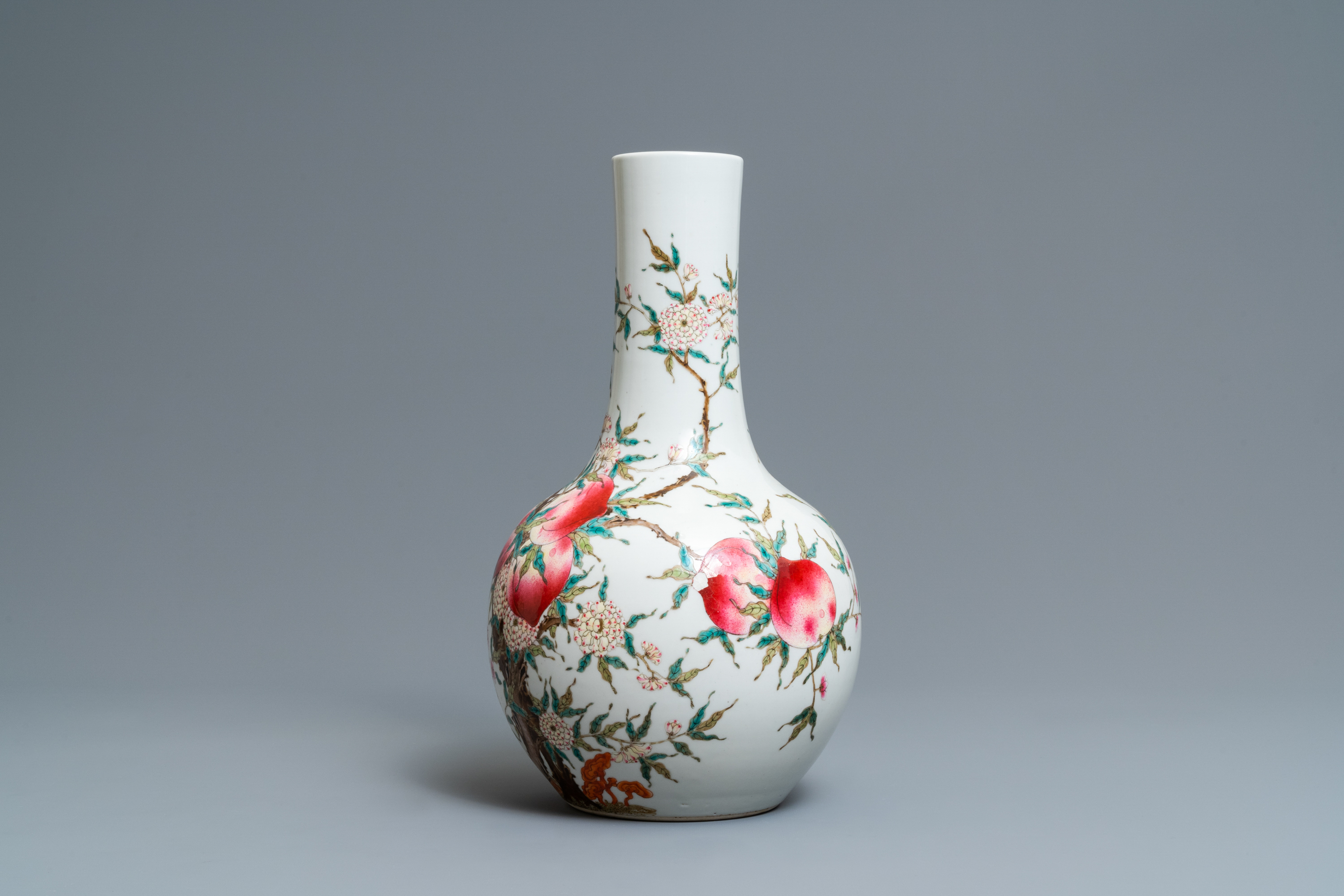 A Chinese famille rose 'nine peaches' bottle vase, Guangxu mark, 19/20th C. - Image 4 of 6