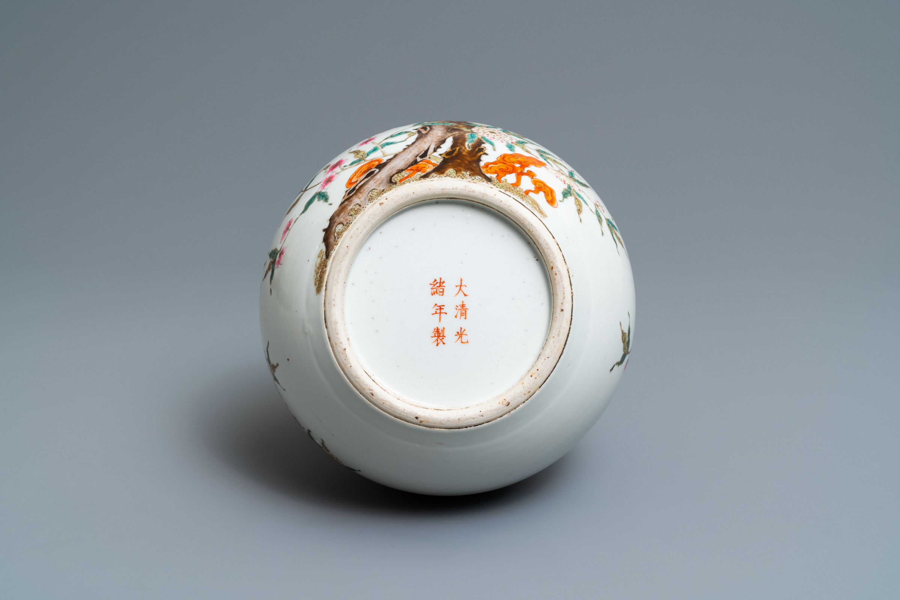 A Chinese famille rose 'nine peaches' bottle vase, Guangxu mark, 19/20th C. - Image 6 of 6