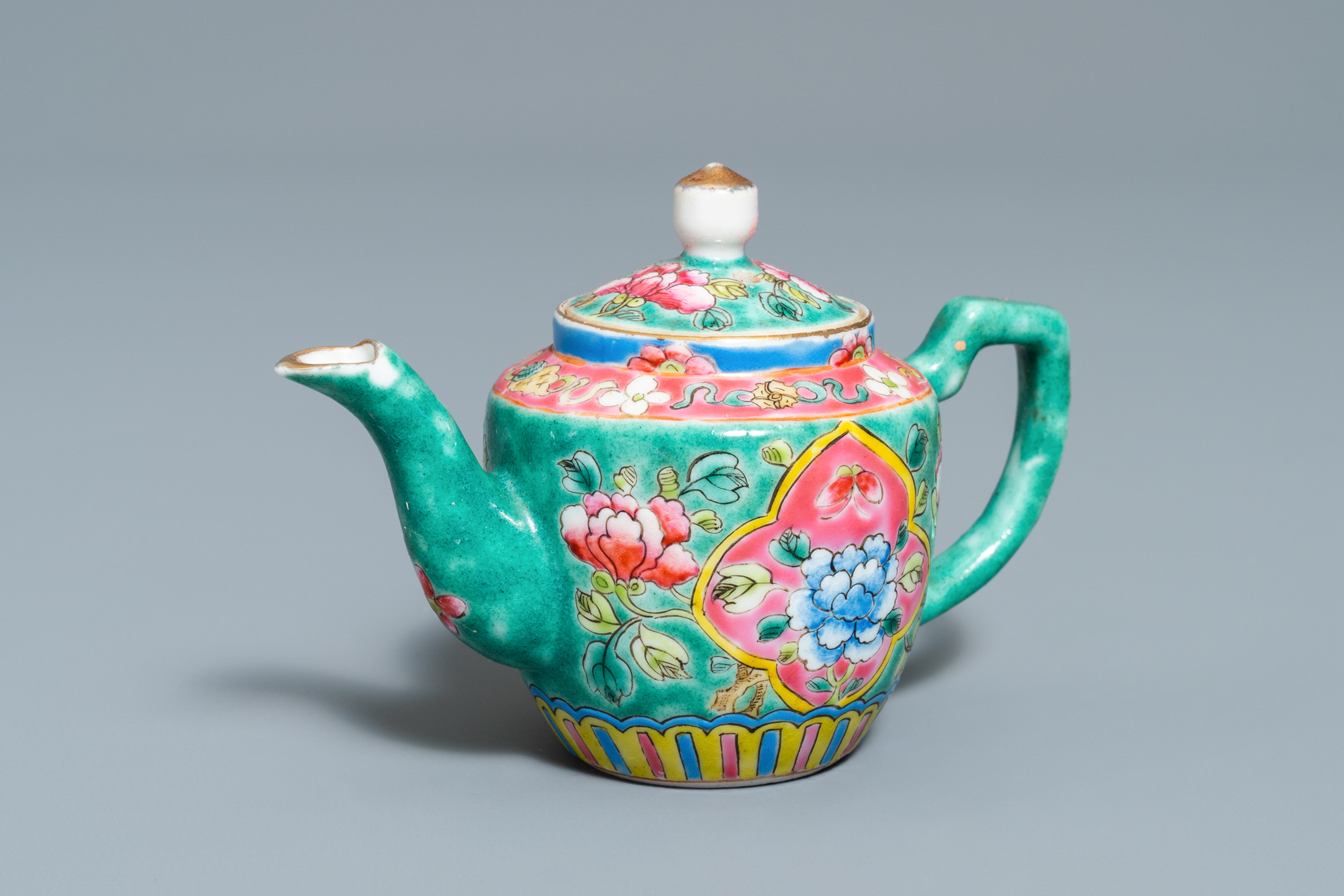 A Chinese turquoise-ground famille rose ewer for the Straits or Peranakan market, 19th C.