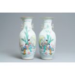 A pair of Chinese famille rose vases with ladies in a garden, 19/20th C.