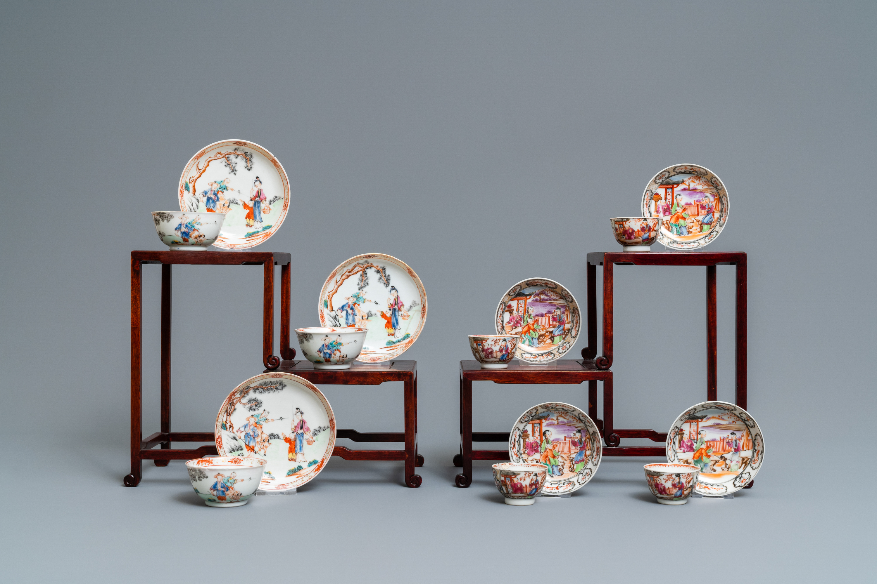 Seven Chinese famille rose 'Mandarin' cups and saucers, Qianlong