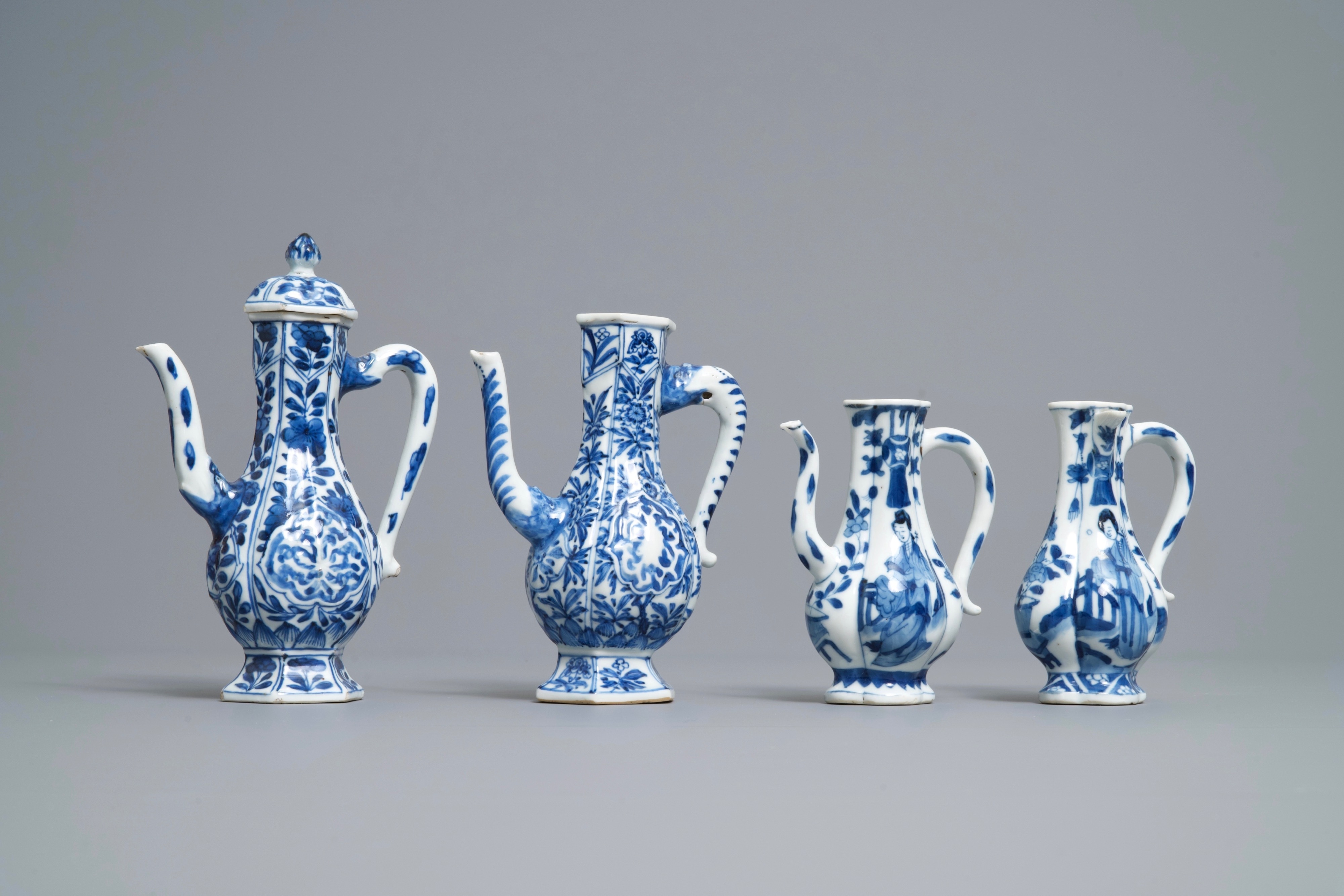 Four Chinese blue and white ewers, Kangxi