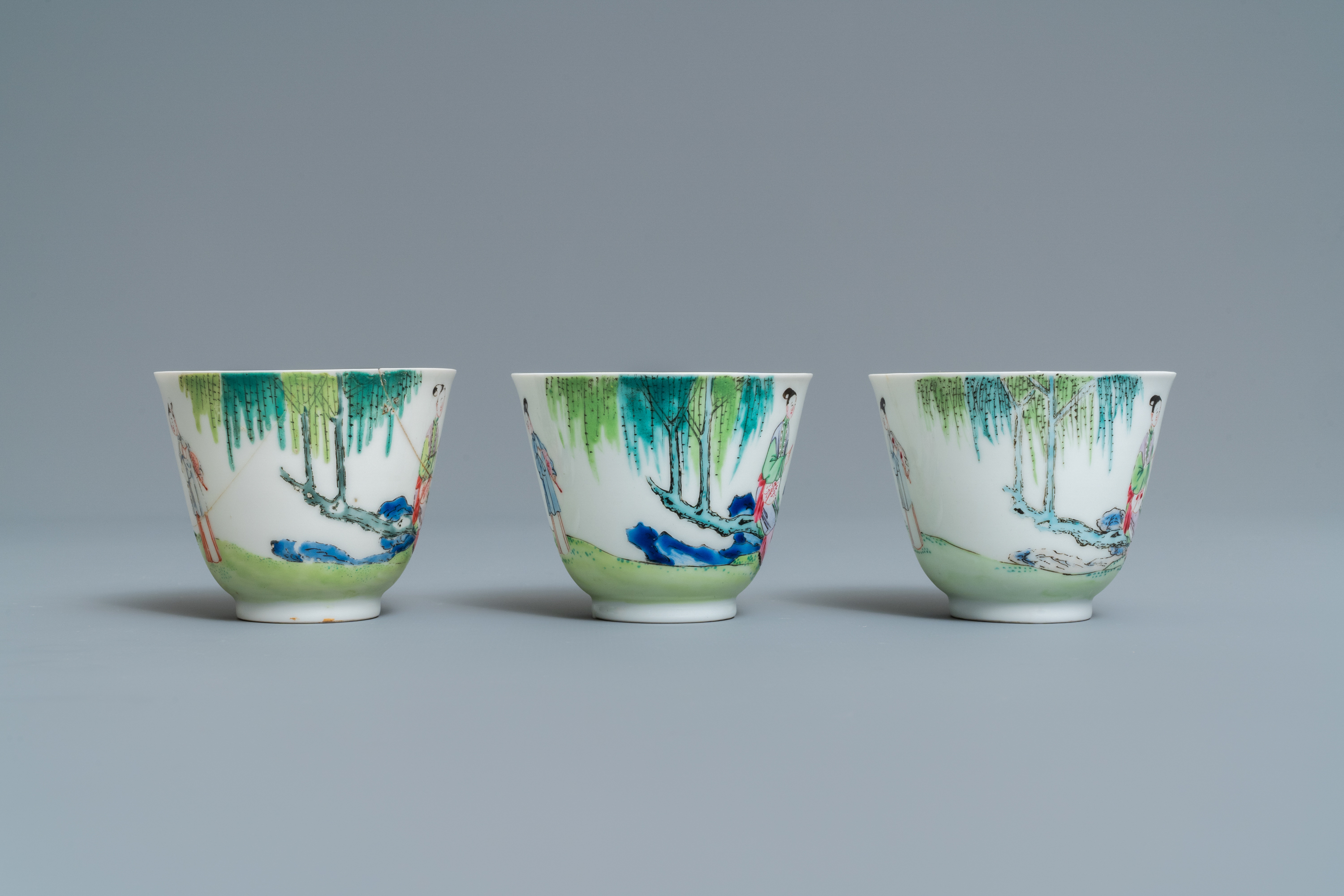 Three Chinese famille rose cups and saucers with figures in a garden, Yongzheng - Image 6 of 9