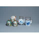 Two large Chinese blue and white and three famille rose teapots, 19/20th C.