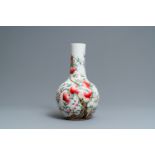 A Chinese famille rose 'nine peaches' bottle vase, Guangxu mark, 19/20th C.
