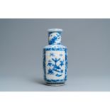 A Chinese blue and white rouleau vase with antiquities and floral designs, 19th C.