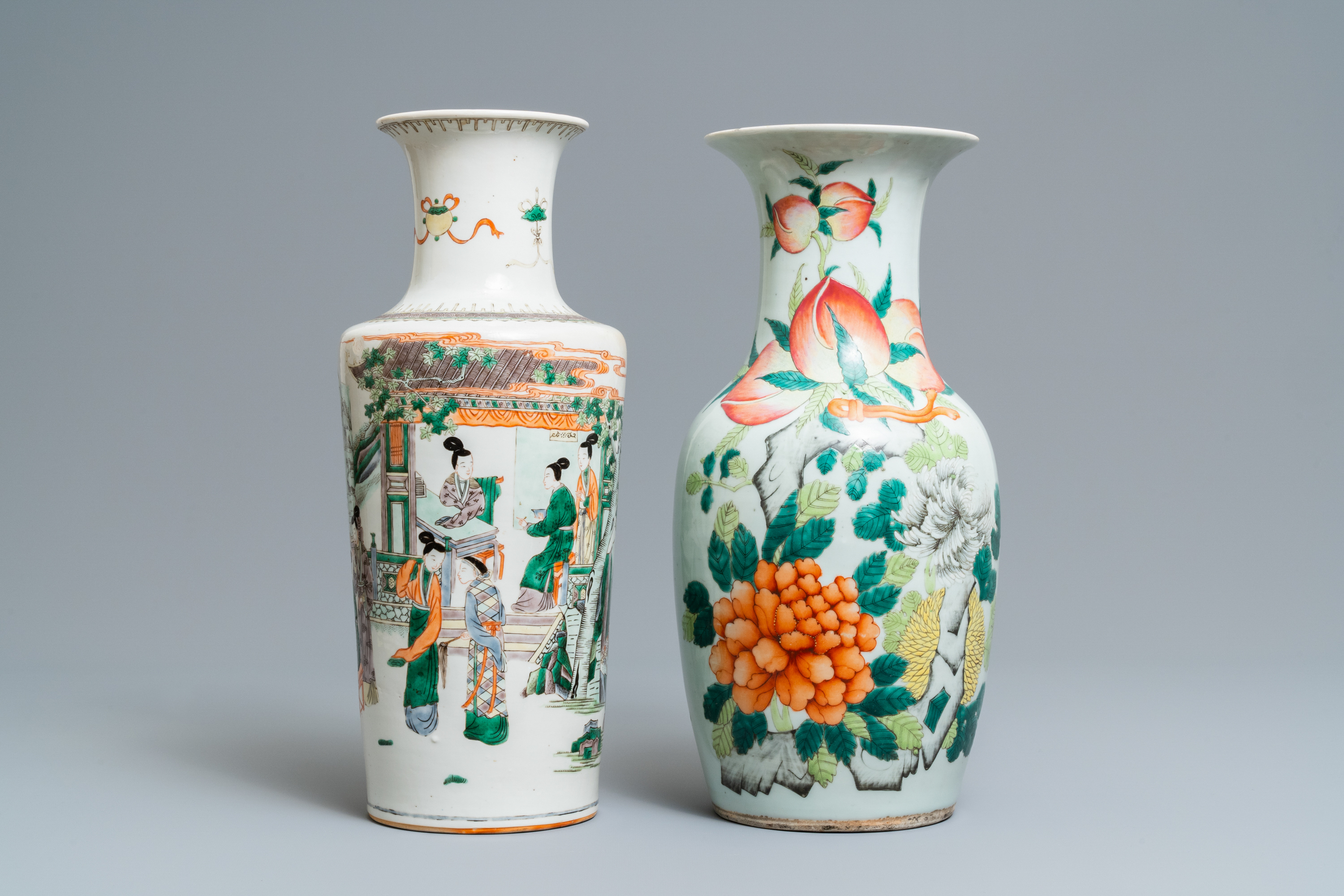 A Chinese famille verte rouleau vase and a famille rose vase, 19th C.