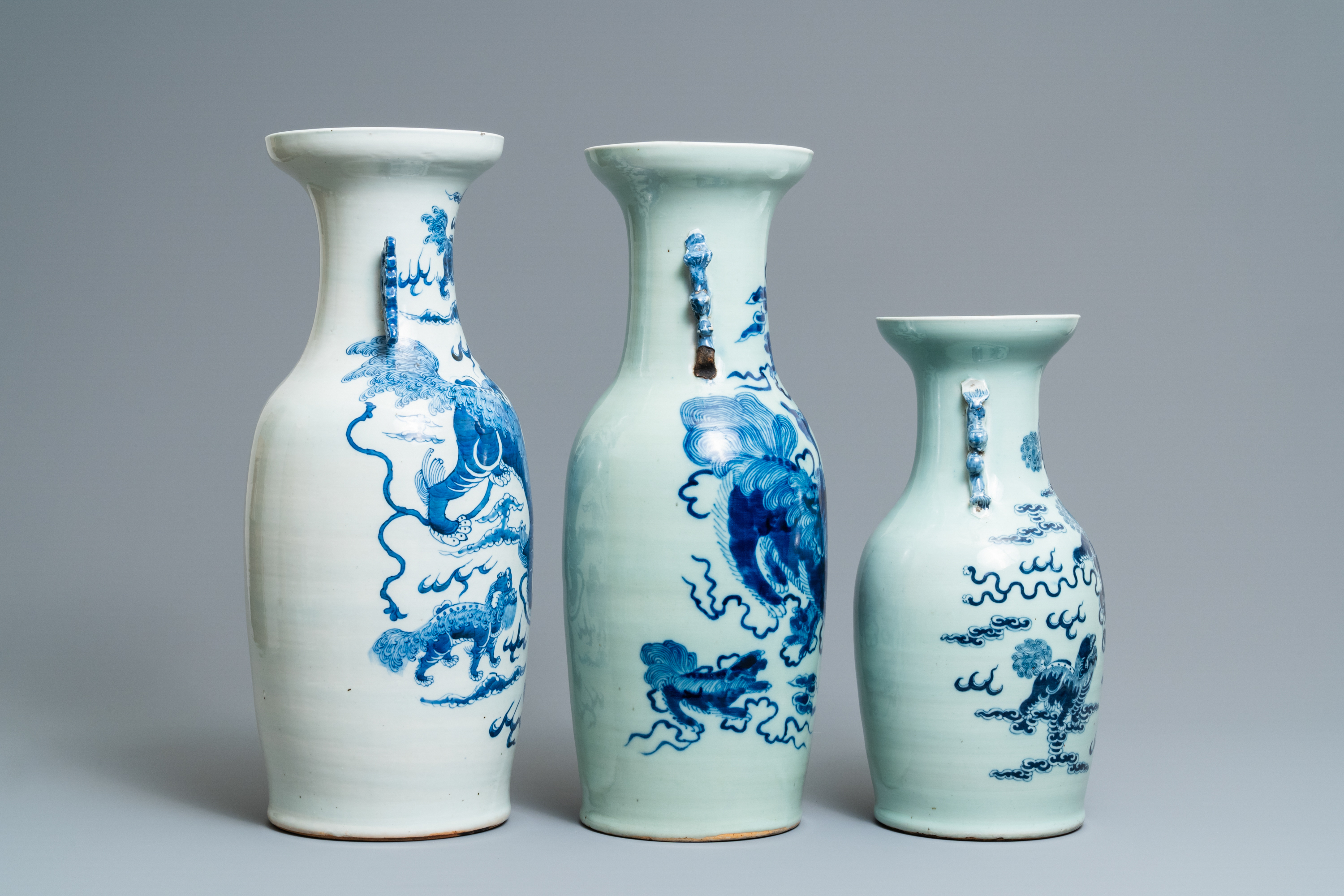 Three Chinese blue and white and celadon-ground 'Buddhist lion' vases, 19th C. - Image 2 of 6