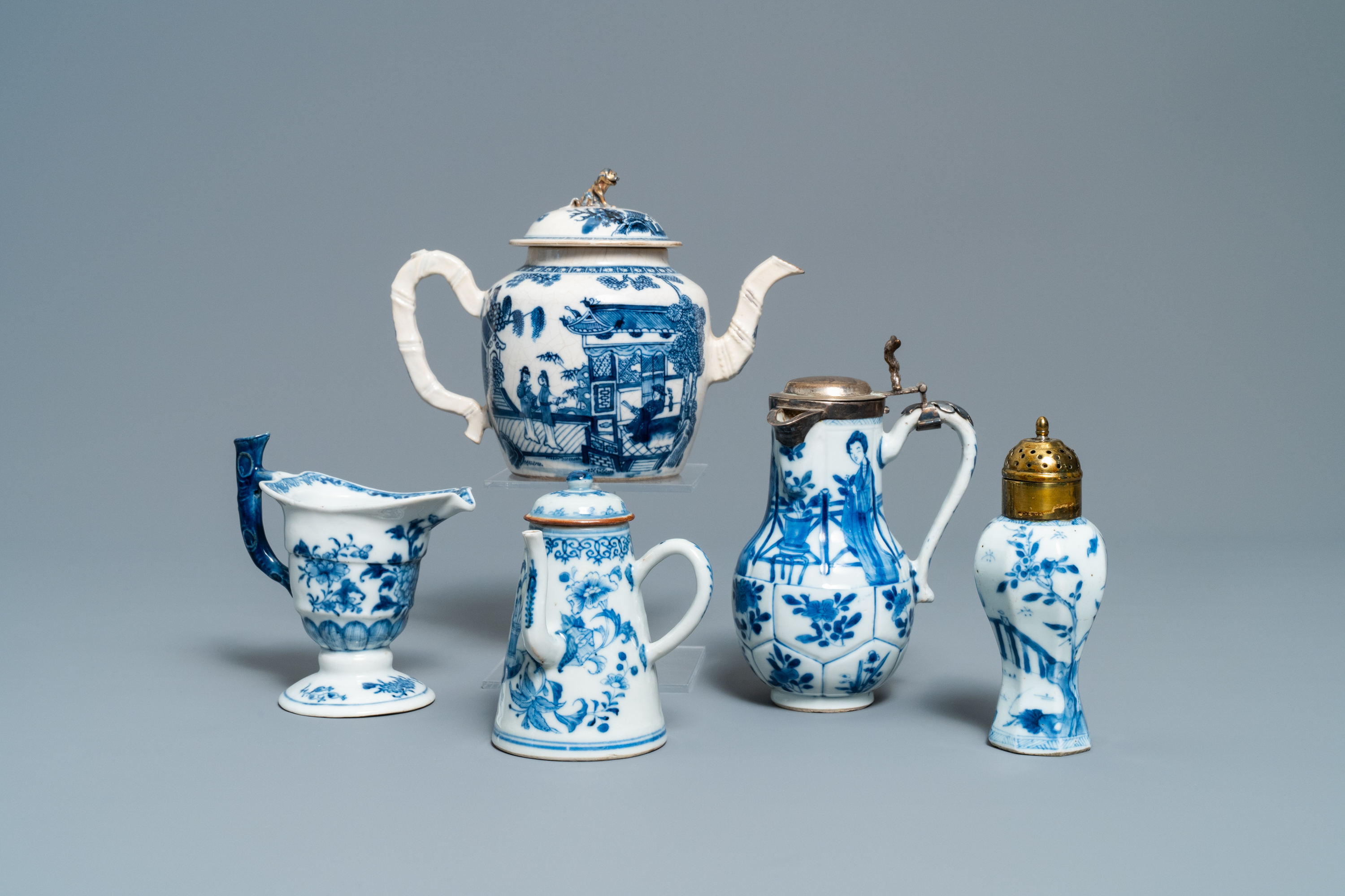 Three Chinese blue and white ewers, a teapot and a metal-mounted vase, Kangxi/Qianlong