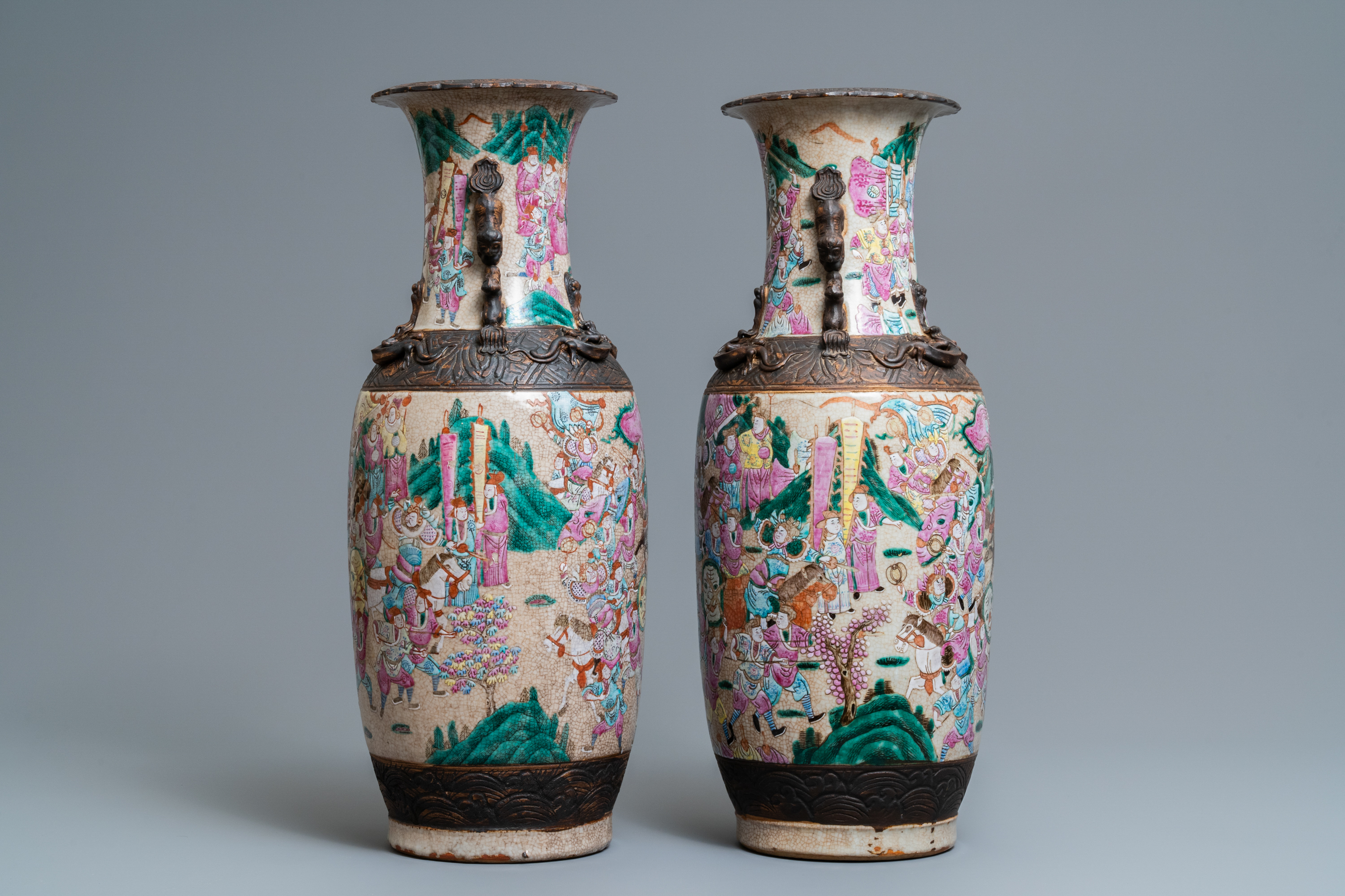 A pair of Chinese Nanking famille rose crackle-glazed 'warrior' vases, 19th C. - Image 2 of 6