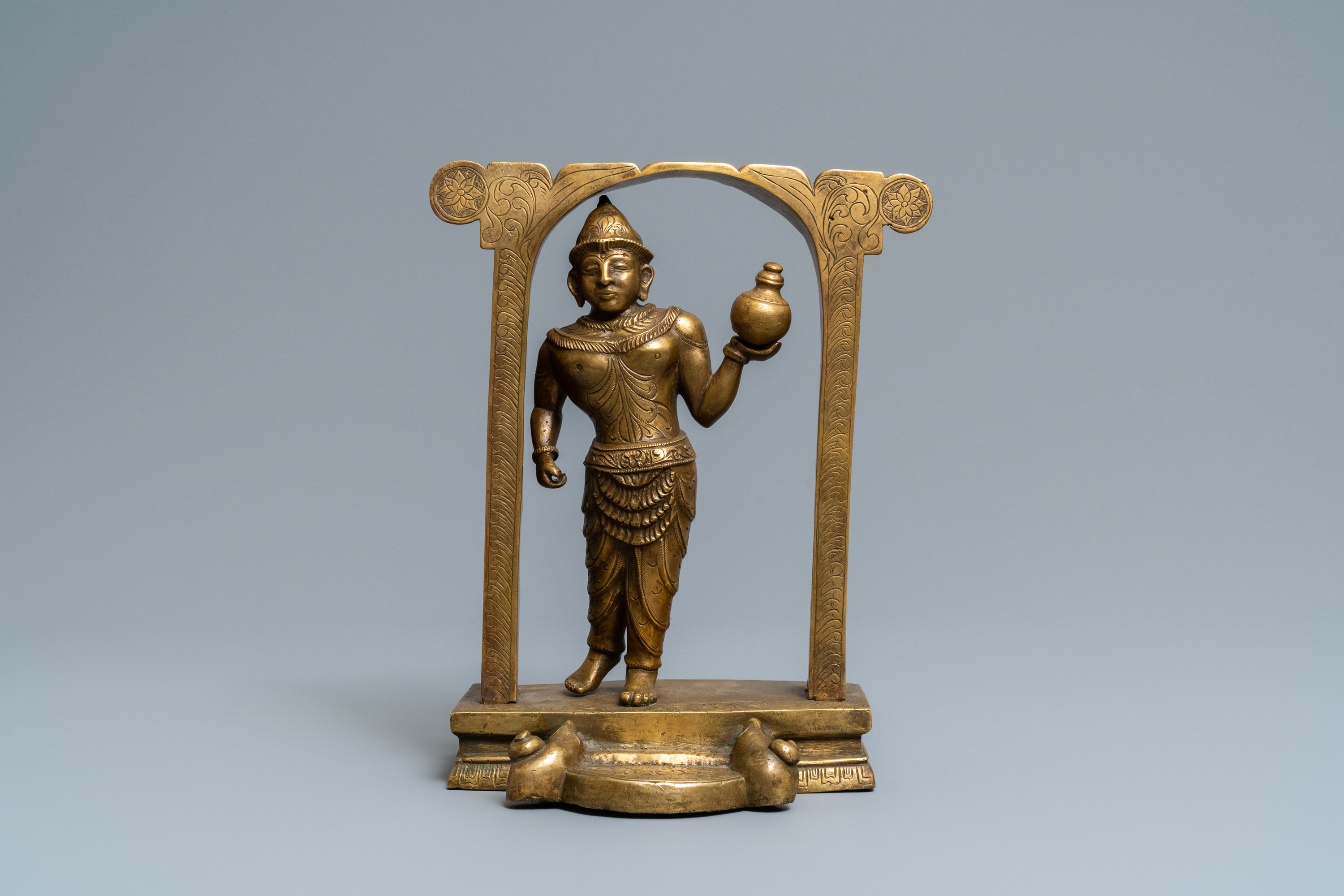 A gilt bronze figure of a temple guardian, Nepal, 19th C. - Image 2 of 7