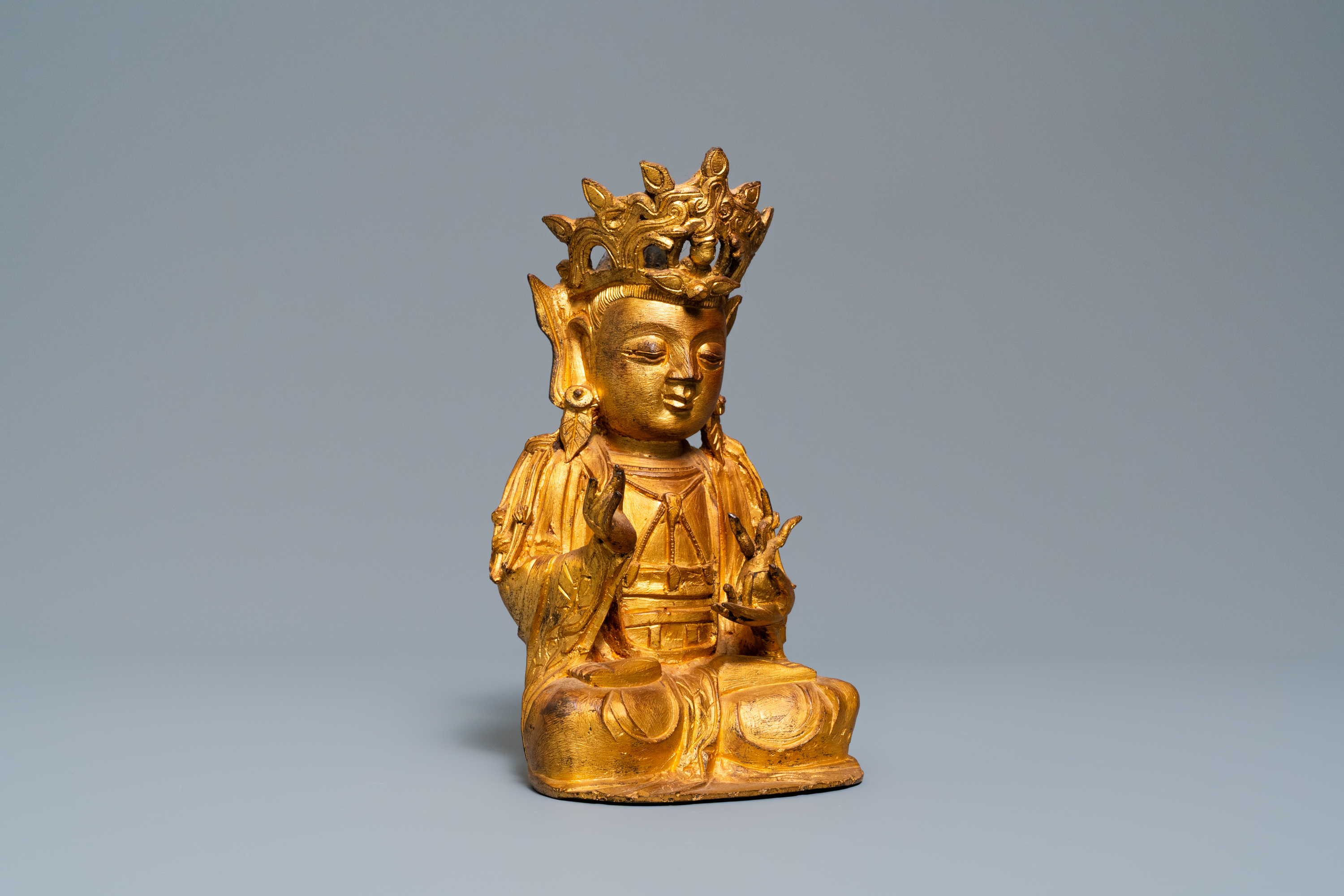 A Sino-Tibetan gilt bronze figure of Buddha, Ming