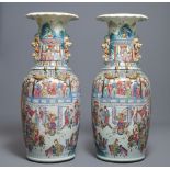A pair of large Chinese famille rose vases with narrative design, 19th C.