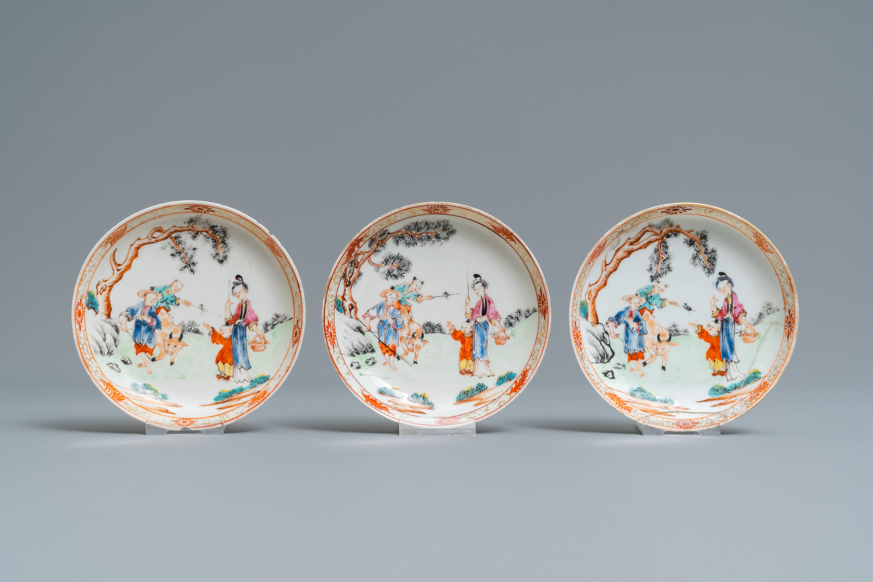 Seven Chinese famille rose 'Mandarin' cups and saucers, Qianlong - Image 2 of 9