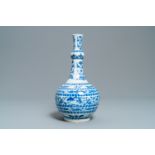 A Chinese blue and white bottle vase with figural medallions, Transitional period