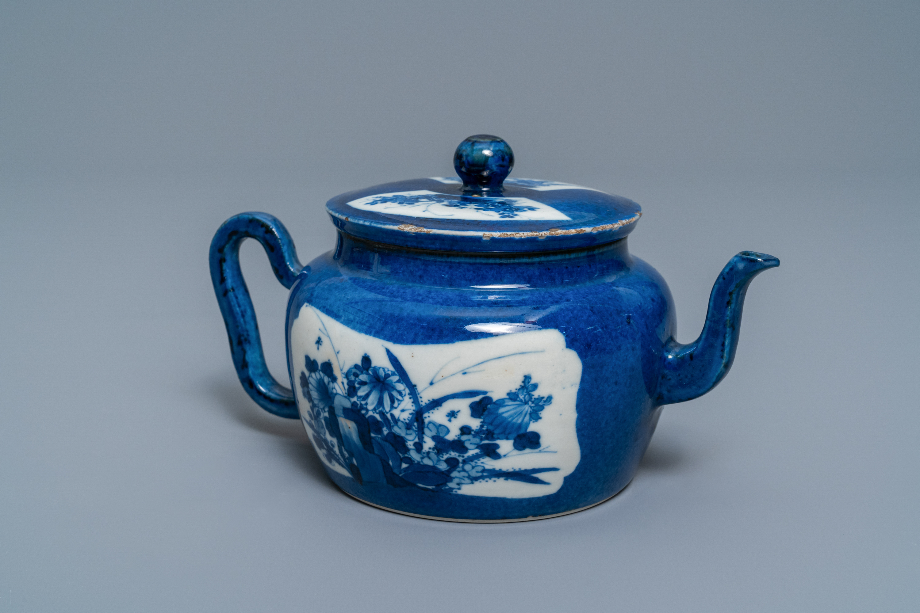 A Chinese powder blue-ground teapot and cover, Kangxi