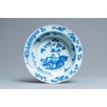 A Chinese blue and white basin with floral design, 19th C.